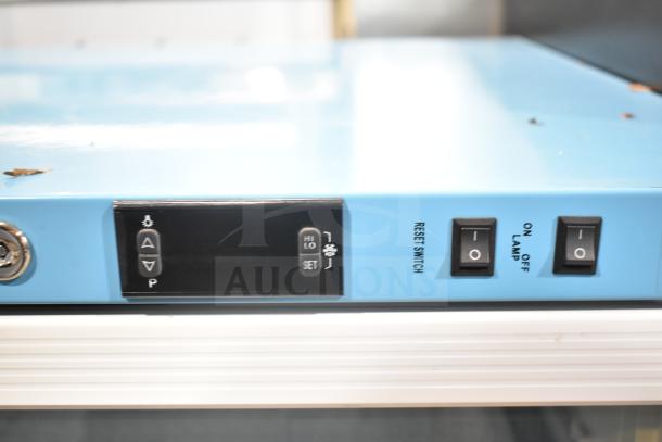 Accucold ARG6PV Mini Cooler Merchandiser control panel with digital display, settings, and on/off switches.