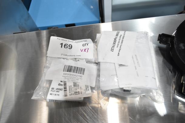 3 new items: HP0085562700 Vulcan Pilot Assy, HP00874127 Hobart Fixed Shoe for HL Series. Marked with auction tag 169 VX3.