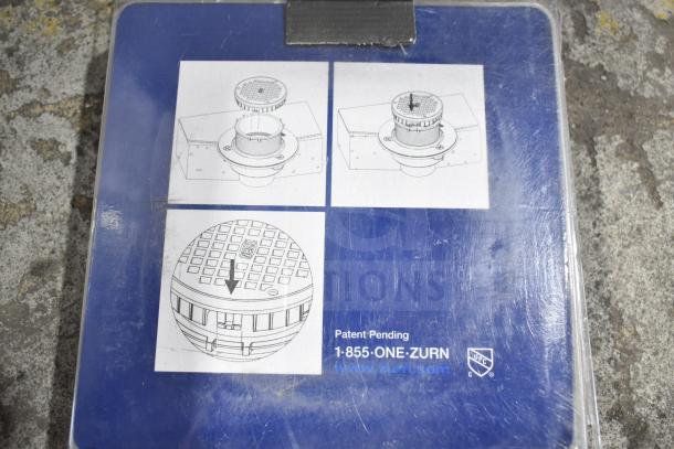 Zurn Elkay 6" stainless steel floor drain access head, new, model 995LCCS06SS, images show assembly process.