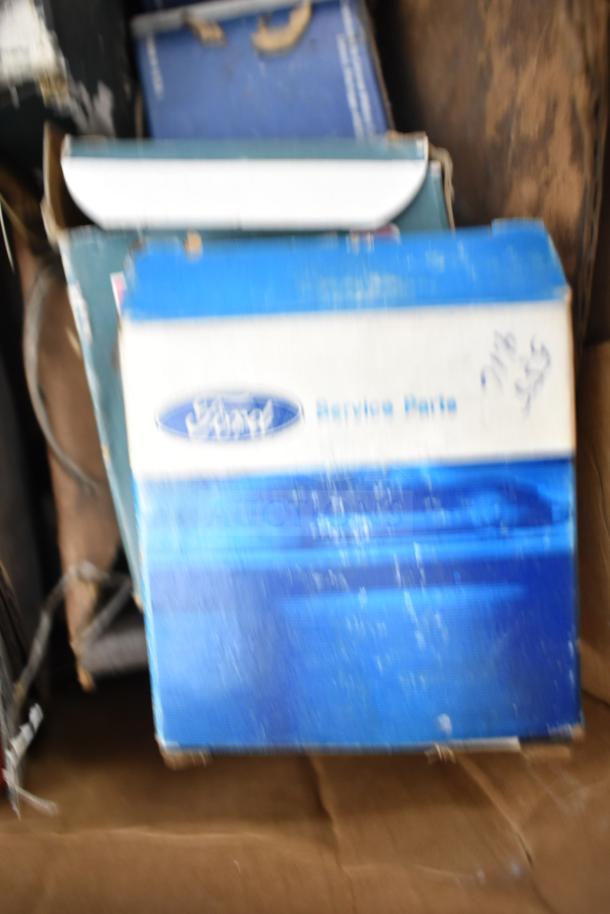 Lot of various automotive items, including a blue Ford Service Parts box. Condition shows wear and old markings.