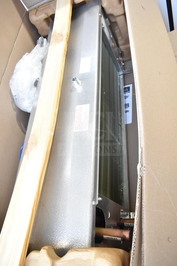 Three brand new "scratch and dent" items, including Bohn BEL0130CC6EEAYF859 evaporator fan, in original packaging.