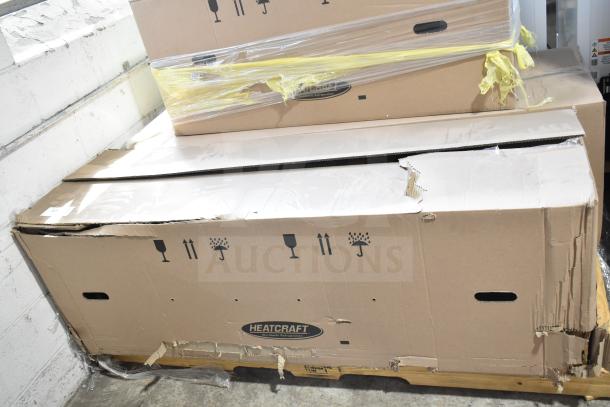 Three new scratch and dent items, including BEL0650AG6AMAD2107, Bohn BEL0130CC6EEAYF859 evaporator fan, in boxes.