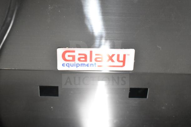 "Galaxy 17GSM2 slushy machine, 3-gallon capacity. Brand new with scratches and dents. 120V, single phase. Logo visible."