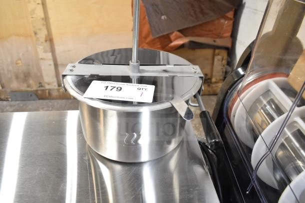 Stainless steel replacement kettle for popcorn popper, brand new with minor scratches, visible auction tag with item number 179.