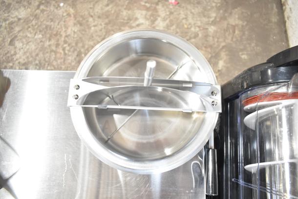 Brand new replacement kettle for popcorn popper, stainless steel, visible scratches and dents, with mounting bracket.