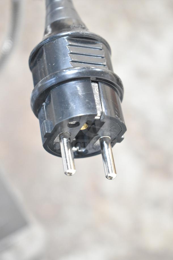 "Replacement kettle power plug for popcorn popper, brand new with minor scratch and dent."