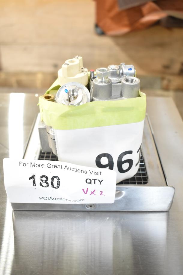 Brand new Robertshaw 7000BMSGOR thermostat, scratch and dent condition; includes auction tag showing quantity of two.