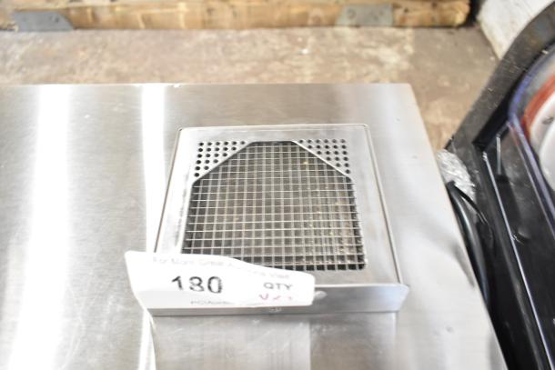 Stainless steel vented panel, new condition, with auction tag reading "180 QTY V2" visible on surface.