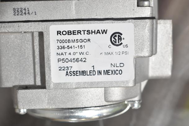 Robertshaw thermostat, model 7000BMSGOR. New, scratch and dent condition. Label states: "Assembled in Mexico."