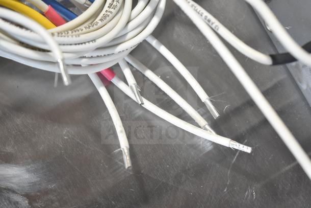 Brand new burner in scratch and dent condition with exposed wiring. Suitable for repair or replacement.