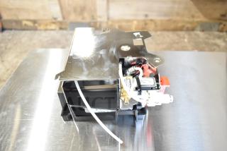 Brand new Avantco 177CHSME32IM espresso group, motor drive Crescendo, model BU50583.0501, scratches visible, tags intact.