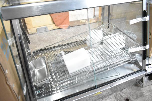 ServIt 423HDM26SA 26" heated display case, stainless steel, 3 shelves, sliding doors, 120V, new condition, slight scratches.