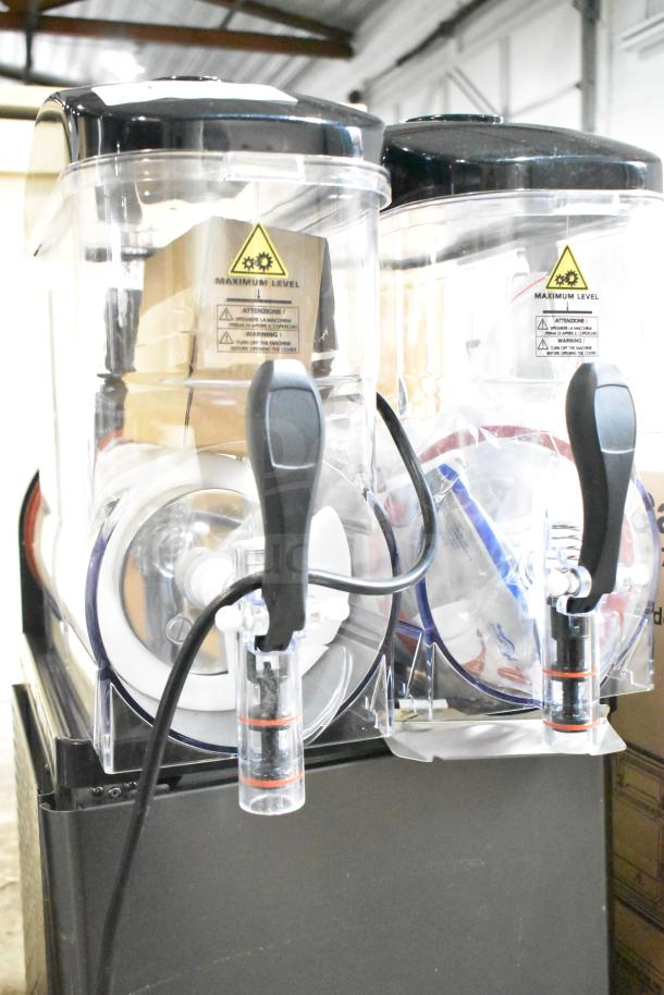 Brand new Galaxy 177GSM2 double 3-gallon pourover granita machine. Visible labels warn of maximum level. 120 volts, 1 phase.