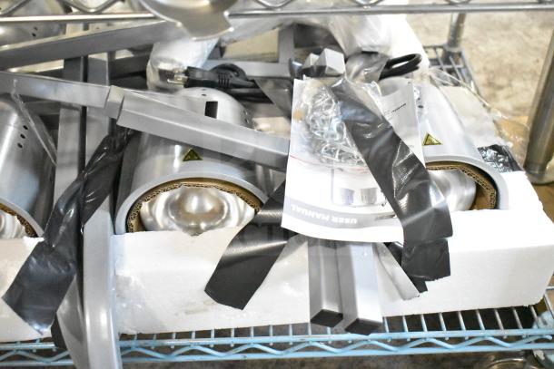 2 brand new ServIt Suspension Bar Heat Lamps, 120V, in package. Scratch and dent condition, includes user manual and mounting parts.