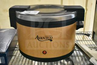 Brand new Avantco 177RWB60W 60 cup electric rice warmer with woodgrain finish, minor scratches. 120V, 1 Phase. Model tag visible.