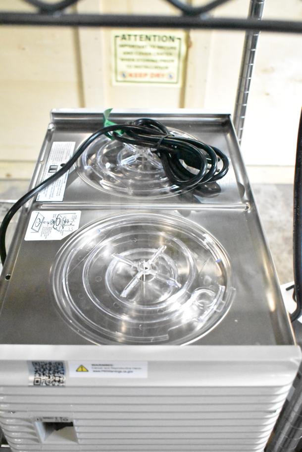 Crathco D25-4 beverage dispenser, brand new with minor scratches, features two 5-gallon bowls and high-impact plastic. 120V, 1 Phase.