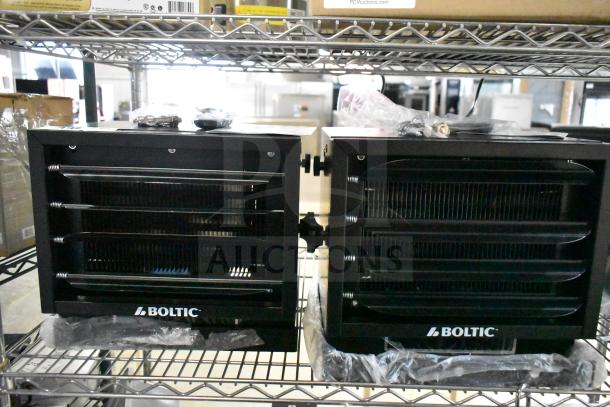 Two brand new Boltic 73AVF7500 electric ceiling-mounted garage heaters, 240V, 7,500W, black, in scratch and dent condition.