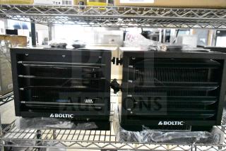 Two brand new Boltic 73AVF7500 electric ceiling-mounted garage heaters, 240V, 7,500W, black, in scratch and dent condition.