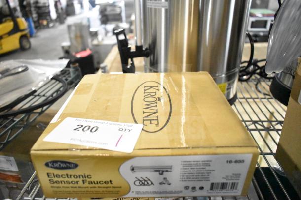 Brand new Krowne 16-655 Royal Series wall mount faucet in box. Box shows "Electronic Sensor Faucet." Model is scratch and dent.