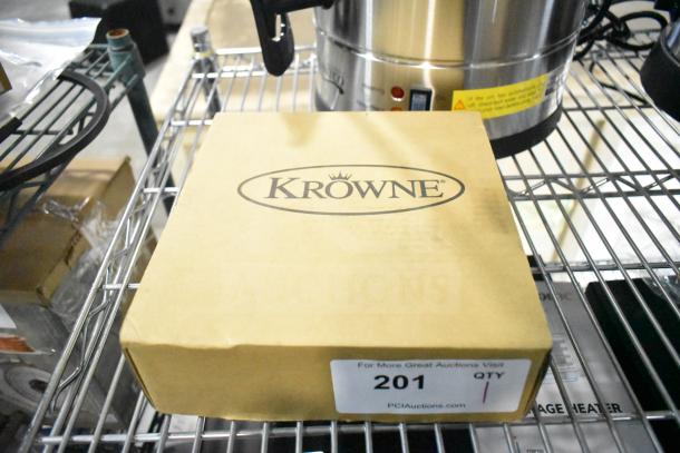 Box with Krowne logo containing a brand new, scratch and dent Krowne Royal Series faucet, wall mount, single hole.