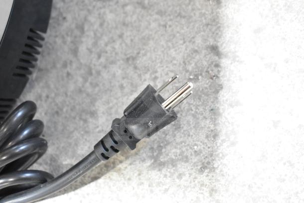 Black power cord and plug detail of Vollrath 7411 Mirage® 11 Qt. Induction Rethermalizer, 120V, 800W.
