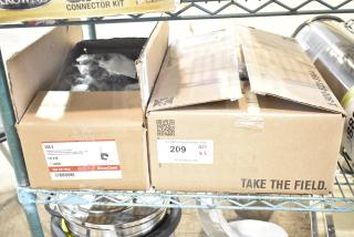 Two brand new boxes of Sioux Chief 556 Series PickUp Talon Tube Hangers for 1/2" and 3/4" CTS piping. Quantity labels visible.