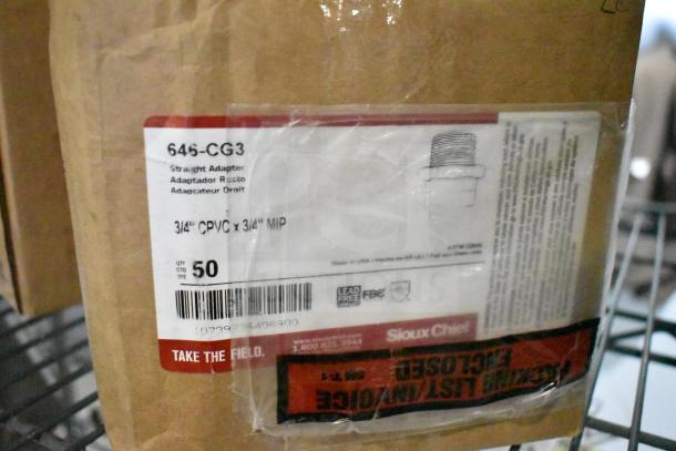 3 brand new scratch and dent items: Regency label holder, Sioux Chief PowerPEX crimp ring, and CPVC socket adapter with package label.