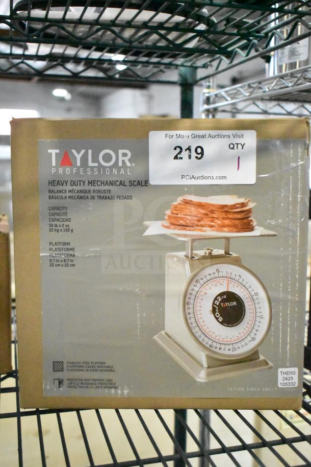 Brand new Taylor THD50 50 lb. mechanical scale, heavy-duty, stainless steel platform, protective lens, boxed with label.