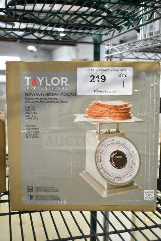 Brand new Taylor THD50 50 lb. mechanical scale, heavy-duty, stainless steel platform, protective lens, boxed with label.