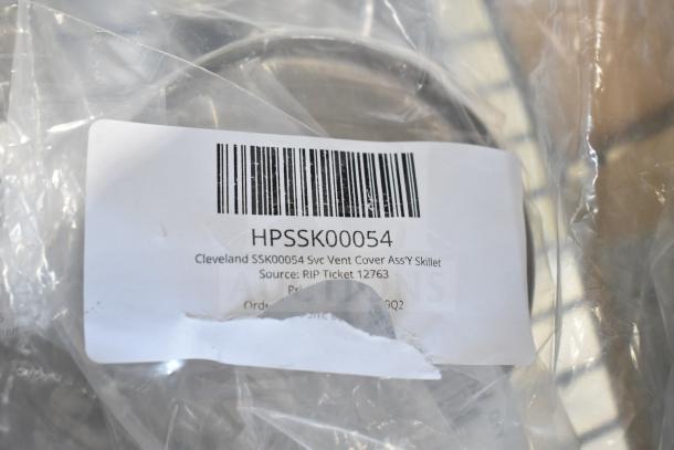 New Cleveland HPSSK00054 Svc Vent Cover Assembly Skillet in sealed packaging with barcode label indicating model details.