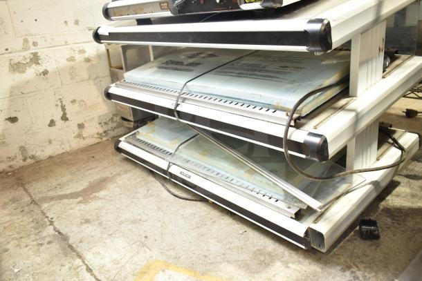 Hatco Glo Ray commercial countertop heated display warmer with visible shelves and cords, 120/208-230 volts, used condition.