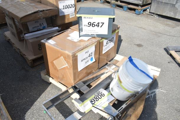 6 new scratch and dent items including Watts grease trap, Canarm exhaust fan, Turbo Air drawer frame on pallets.