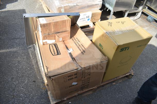 Four brand new items on a pallet: Rubbermaid utility cart box, STI WBO-12L box, and other labeled boxes.