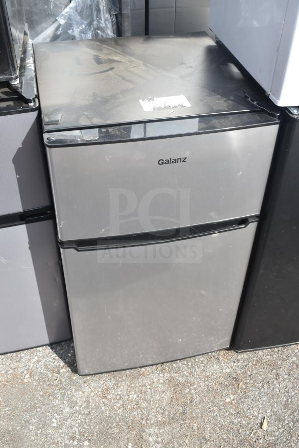 Five mini coolers including Accucold FS24L Freezer and Galanz models GLR33MBKE23, GLR31TS1E02. 115 Volts, 1 Phase. Dusty condition.