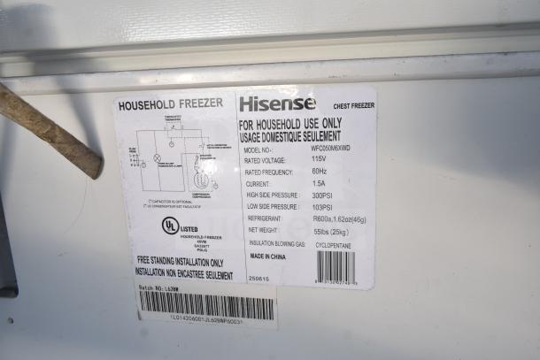 Hisense WFC050M6XWD Chest Freezer label showing specifications: 115V, 60Hz, 1.5A, 55lbs, R600a refrigerant.