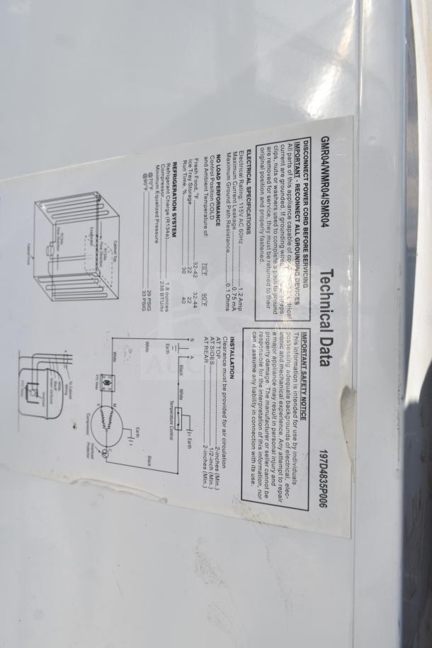 GE GMR04AAMWW mini cooler technical data label showing electrical specifications and installation guidelines.
