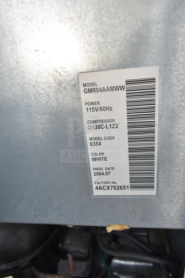 GE GMR04AAMWW mini cooler label showing model, power 115V/60Hz, compressor 30C-L1Z2, color white, prod date 2004.07.
