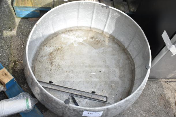 Large metal bin with a weathered surface and handle. Features a label marked "239" indicating item details. Suitable for industrial use.