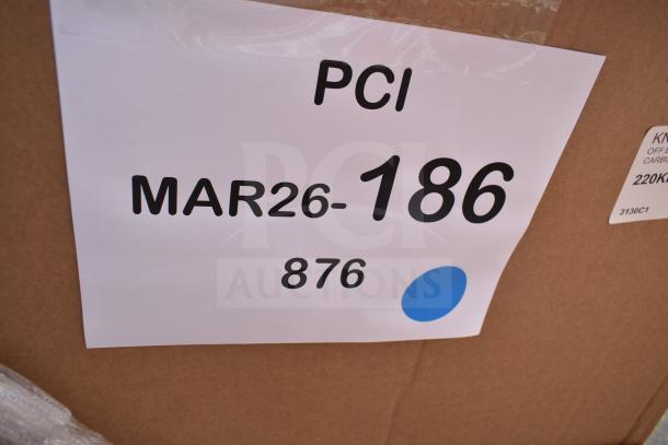 Label on cardboard box with text "PCI MAR26-186 876," indicating auction lot number for four brand new scratch and dent items.