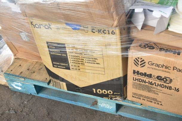 Pallet with boxes labeled Karat and Hold & Go, containing PET cups and hot cups, some scratch and dent; multiple items.