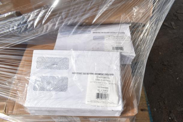 Sealed stack of envelopes, labeled for 1099 2-Up Forms, 100 pack, featuring security tint and double window.