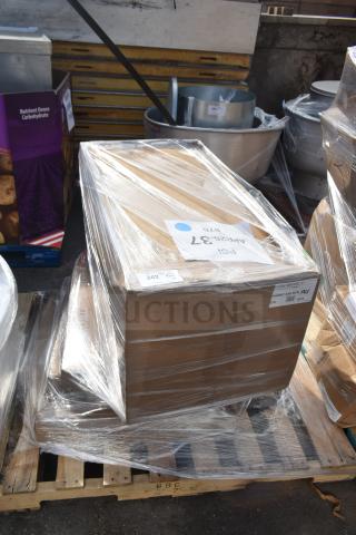 Sealed pallet with six brand new, scratch and dent items, including bar stool frame, tabletop, and equipment stand labeled "APR26-37."