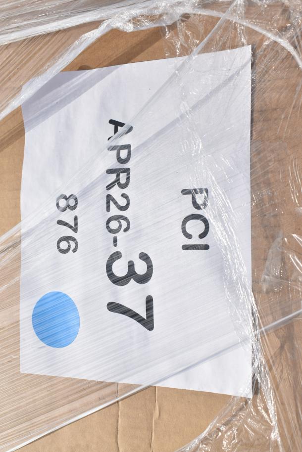 Packaging labeled "PCI APR26-37" containing 6 new scratch and dent items, wrapped in plastic.