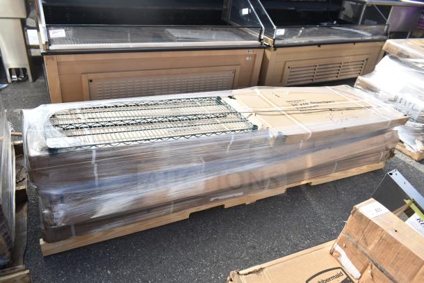 Eight new scratch and dent items including wire shelves, pallet-packed. Boxes show model APR26-43, condition noted.