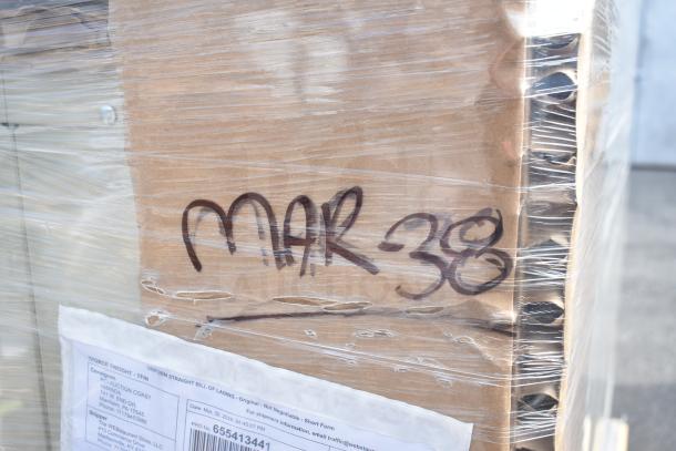Plastic-wrapped package labeled "MAR-38" containing 6 new scratch-and-dent items, including a locker and underbar sink.