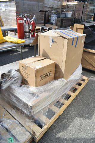 Pallet with mixed box items, including a Steelton sink. Boxes are sealed, some with minor dents. Perfect for bulk purchase.