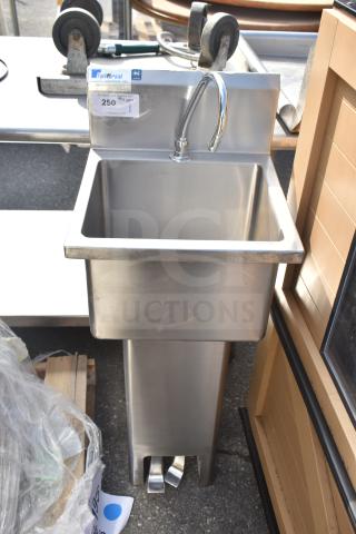 Universal Single Bay Foot Pedal Sink, stainless steel, polished finish, good condition, label reads "250" with brand details.