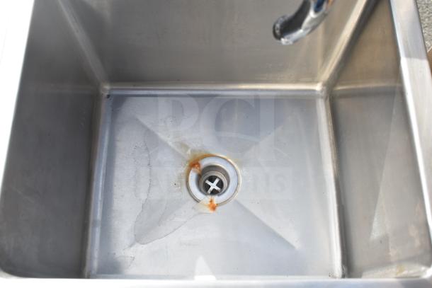 Universal Single Bay Foot Pedal Sink, stainless steel, used condition, visible drain stains, ideal for commercial use.