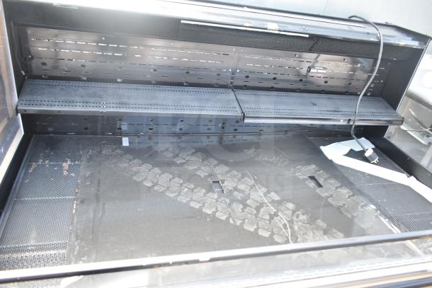 Killion Metal Commercial Open Grab N Go Merchandiser, 208/230 Volts, 1 Phase, shows shelving and power cord, used condition.