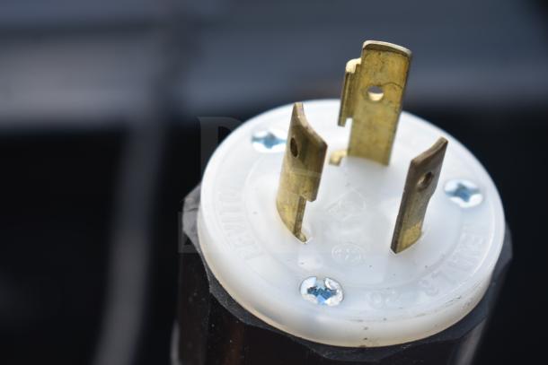 Close-up of a power plug for a Killion Metal Commercial Open Grab N Go Merchandiser, showing 208/230 volts capacity.